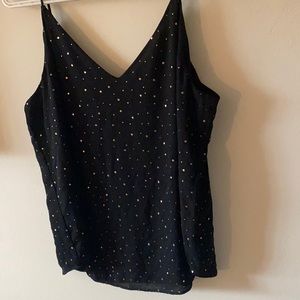 Cute cami blouse, great under a blazer, cardigan or cute worn by itself!